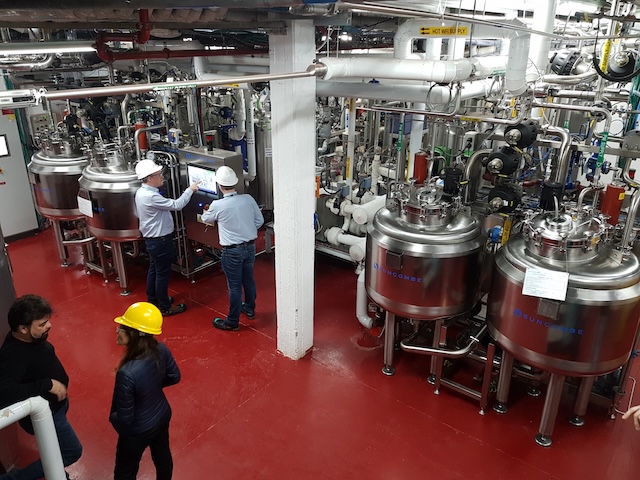 ways to prevent cross contamination, A picture of engineers in a pharmaceutical processing unit